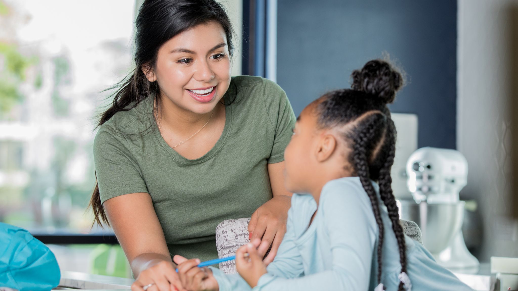 an au pair interacting with a young child