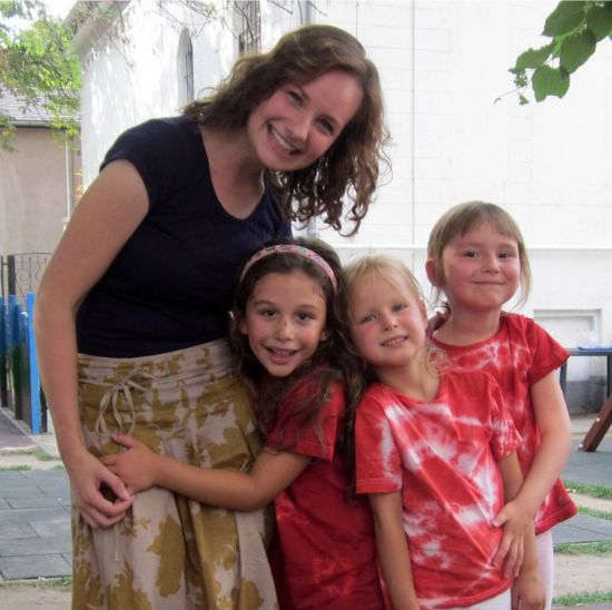 a young woman with young children