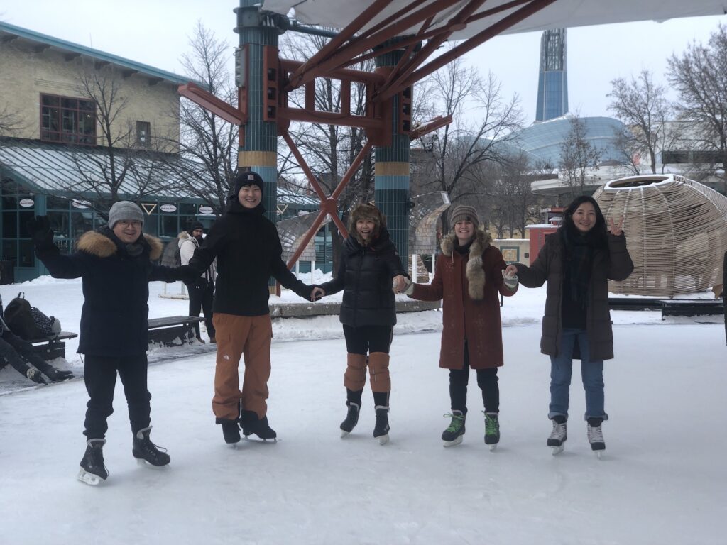 Jeannine and students ice skating.