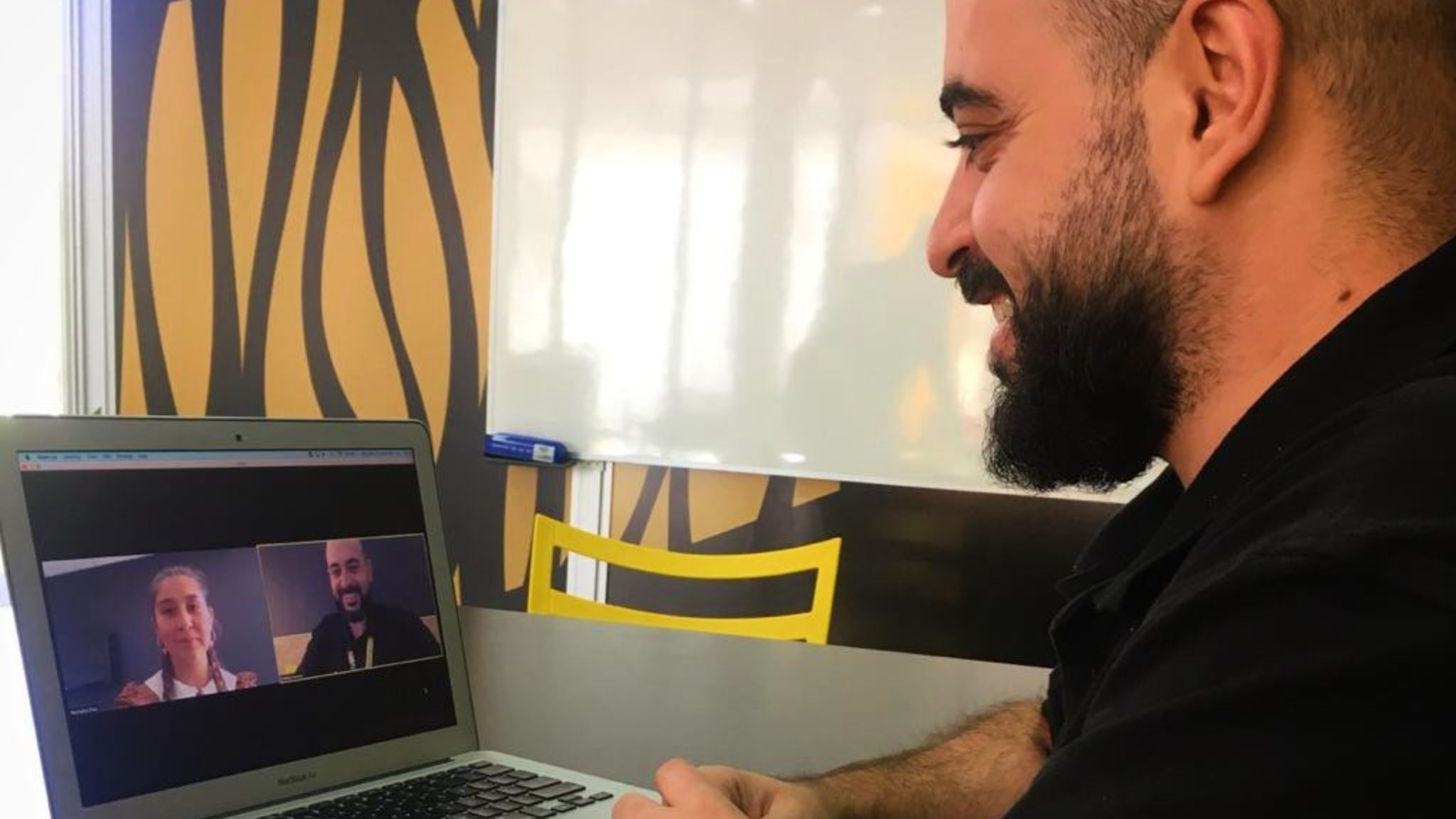 a teacher working with an online student