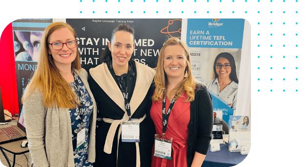 become-sponsor Three Bridge employees and partners smile in front of a Bridge stand at an event