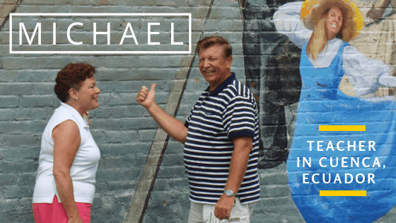BridgeTEFL Graduate and teacher, Michael, with his wife in front of a mural in Cuenca Ecuador