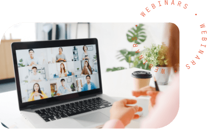 watch-banner A person watching a webinar with other teachers on a laptop